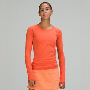 Lululemon Swiftly in warm coral (size 6)